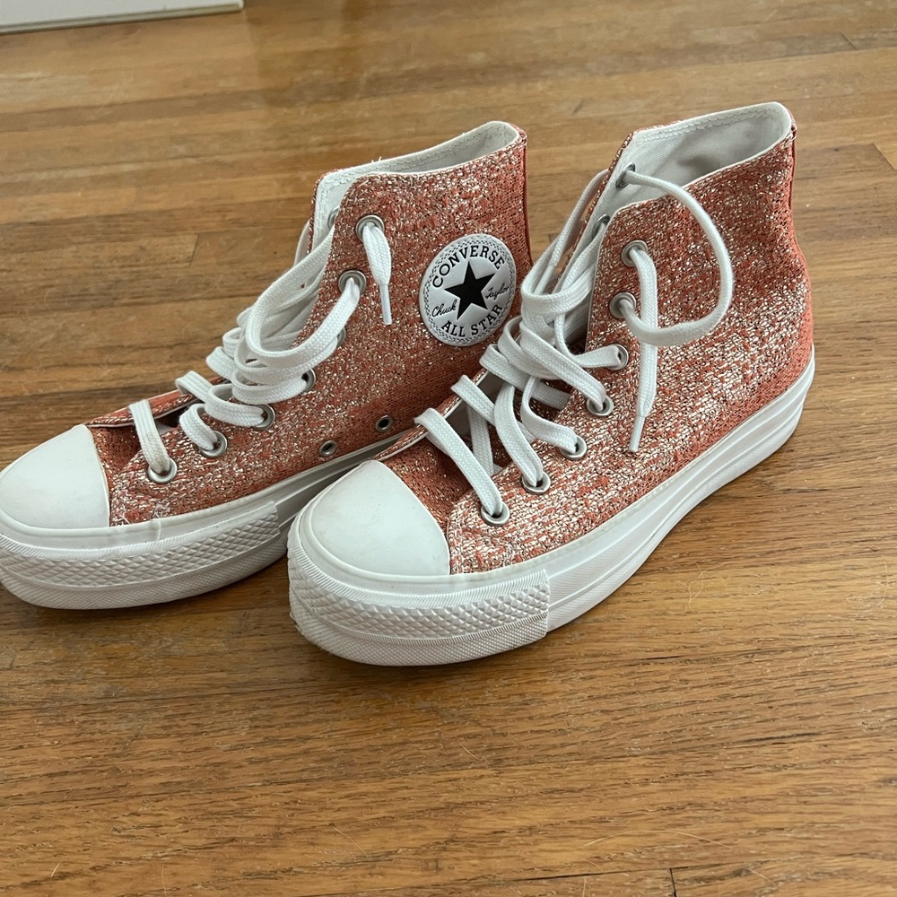 Coral and gold platform high top converse